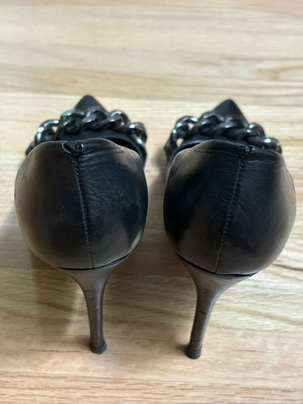 Thomas Wylde Maison black leather pumps - pointed toe and chunky chain detail.